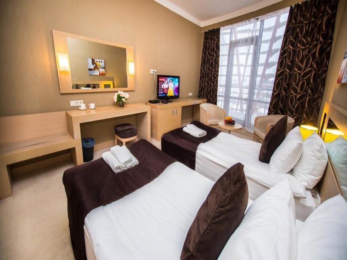 Alau Hotel Астана Стая снимка
