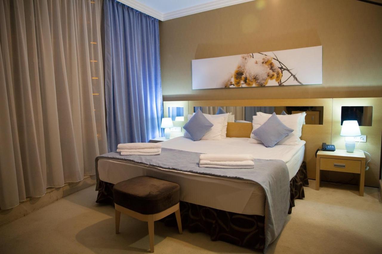 Alau Hotel Астана Екстериор снимка